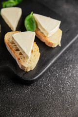 Processed cheese spread portion size cheese for sandwich tasty snack fresh delicious gourmet food background on the table rustic food top view copy space
