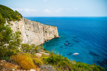Blue Caves Zakynthos Island Greece rocky cliffs meeting clear blue water breathtaking coastal view and must see destination for visitors