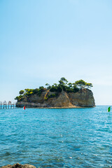 Scenic Cameo Island Zakynthos Greece surrounded by clear blue water with bridge connection and...