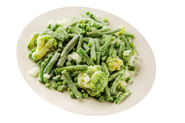 Frozen green vegetables green peas, broccoli, string beans, kohlrabi kale tasty snack fresh gourmet food background on the table rustic food top view copy space vegan and vegetarian food