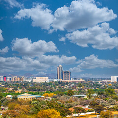 Obraz premium aerial view of Gaborone, residential neighborhood and CBD towers, in the capital of Botswana , African developments
