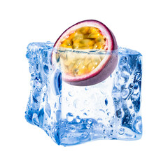 Half of fresh passion fruit in ice cube on white background