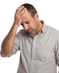 Naklejka premium Adult male looking stressed while holding head with one hand, shirt with rolled sleeves isolated on a transparent background.