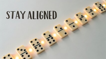 Stay Aligned with Dominoes on a Light Table for an Inspiring Message