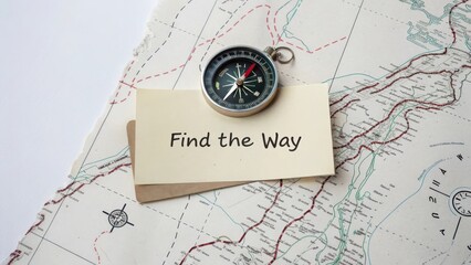 Vintage Compass on Map with 'Find the Way' Note for Adventure