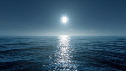 Obraz premium Vast expanse of tranquil ocean surface, illuminated by a bright sun, reflecting serene calmness.