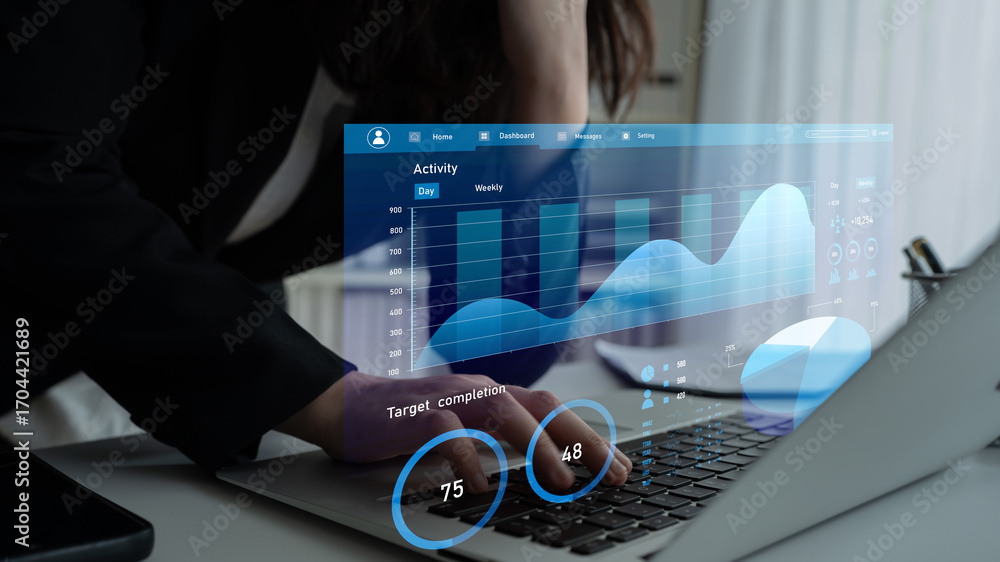 Aufkleber a business professional focuses on data analysis using a digital dashboard displayed on their laptop