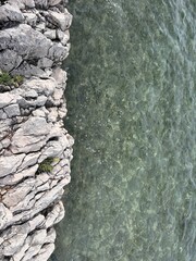 old stone wall near sea