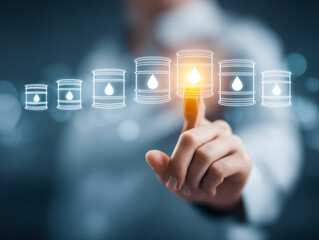Businessman engaging with digital interface showing ascending series of fuel barrels symbolizing energy resources and consumption trends in a futuristic concept