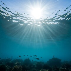 Obraz premium Sunlight streams through the tranquil ocean depths, illuminating a vibrant coral reef landscape.