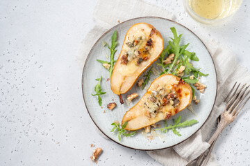 Pear baked with blue cheese, honey and walnuts