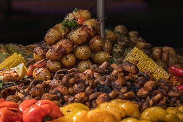 Food market. Farm produce. Grilled vegetables. Street food. Food and drinks. Crispy crust. cooked on fire. Grilled dish. Vegetarian menu. Street restaurant.