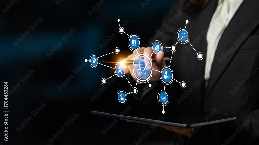 Poster a business professional uses a tablet to interact with digital network icons, showcasing technology 
