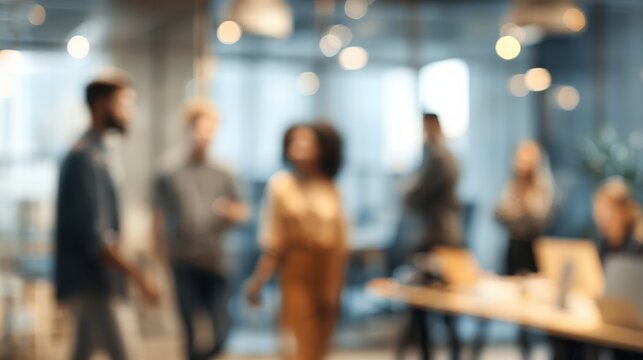 a collaborative office environment featuring blurred team members in casual attire with a bokeh background conveying creativity and modern professionalism