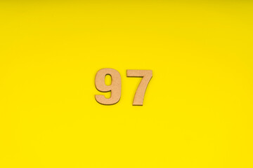 Number ninety-seven on yellow background