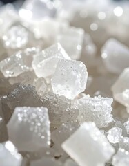 Close-up of many small, white, crystalline cubes
