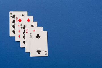 Playing cards on color background, top view. Casino card game
