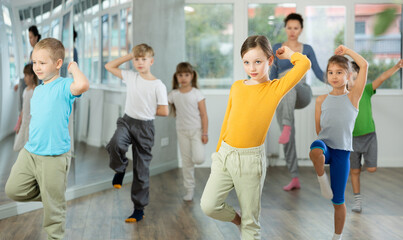 Obraz premium Group of children boys and girls dance hip hop in studio