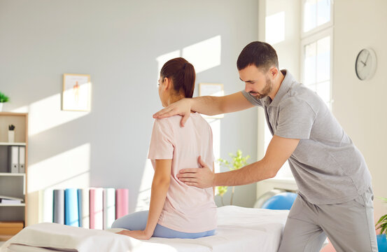 Rehabilitation, woman back, spine, shoulder massage, physical therapy by professional nurse, manual chiropractor, physical therapist doctor. Injuries, trauma problems, exercise for mobility, posture - Powered by Adobe