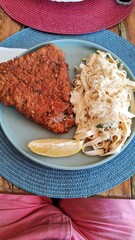 Delicious dish with fried fish and pasta.