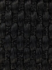 Obraz premium Macro View of Black Woven Fabric Texture Detailed Fiber Pattern Textile CloseUp.