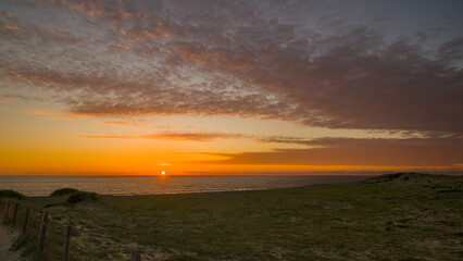 Sunset and evening atmosphere on the beach of Hossegor, France