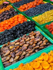 A colorful assortment of dried fruits at the market