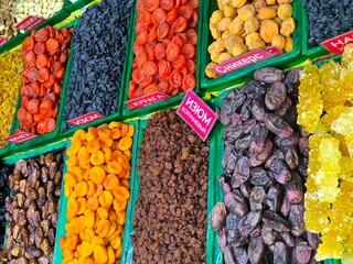 A colorful assortment of dried fruits at the market