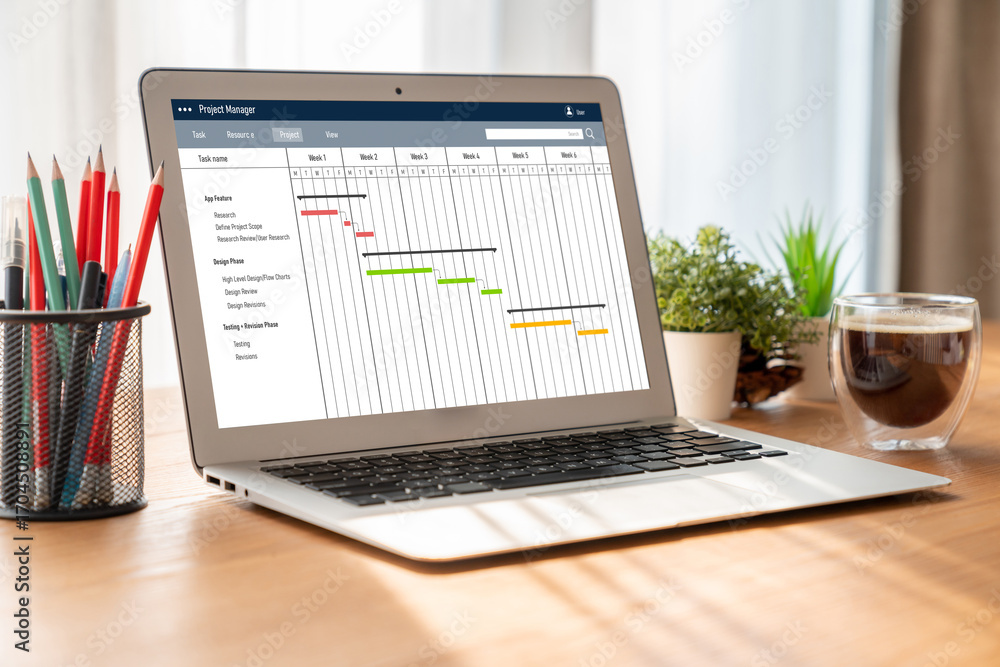 Aufkleber project planning software for modish business project management on the computer screen showing time