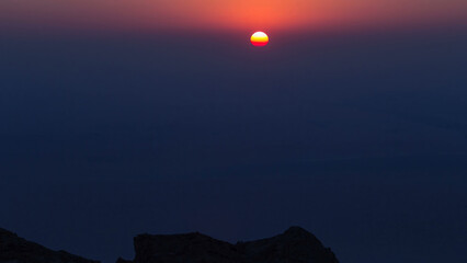 Sunset with rocks timelapse. Jebel Hafeet is a mountain located primarily in the environs of Al Ain