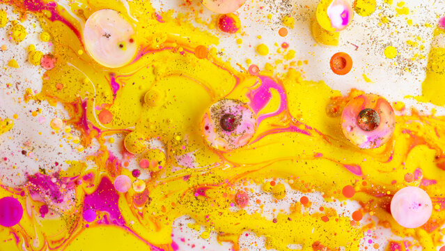 Colorful abstract liquid art background with pink yellow orange bubbles, vibrant psychedelic fluid paint texture, bright modern creative design
