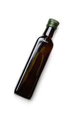 Square bottle flaxseed oil lies isolated top view