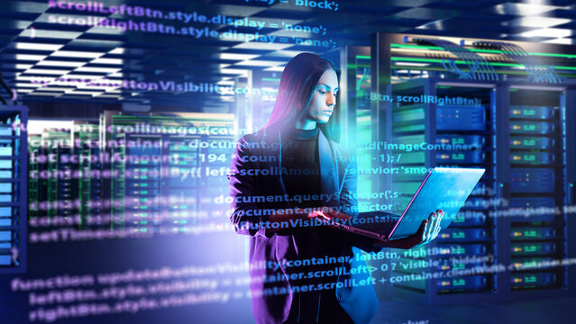 Specialist with laptop monitors data center operations and analyzes system code. IT infrastructure management ensures network stability, cybersecurity and continuous digital services.