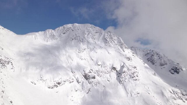 Blackcomb mountain peak, ski resort, snowy mountain peak, Whistler Blackcomb. 4K 24FPS