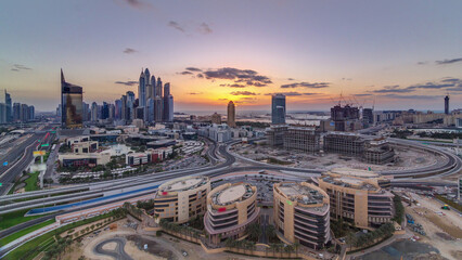 Sunset over Dubai Media City with Modern buildings aerial timelapse, United Arab Emirates