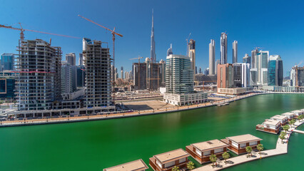 Skyscrapers near canal in Dubai near wonderful canal aerial timelapse