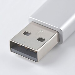 Close-up of a silver USB flash drive connector