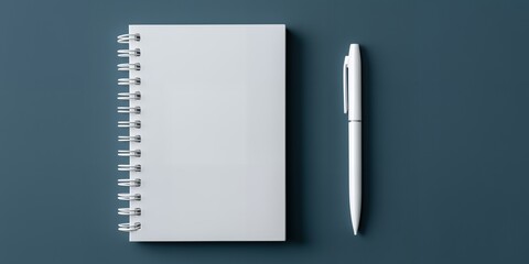 Minimalist shot of a spiral bound white notebook and a sleek white pen on a dark teal background, concept for creative writing, educational notes and business planning