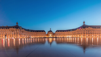 Fototapeta premium Place de la Bourse and Miroir d'eau day to night timelapse in Bordeaux, France