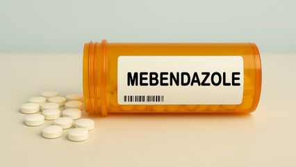 Box of MEBENDAZOLE tablets on a hospital pharmacy table used to treat parasitic worm infections an anthelmintic.