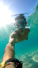 Underwater selfie of a person snorkeling