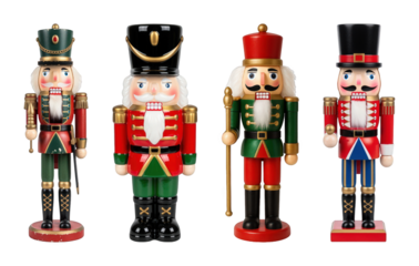 Traditional nutcracker figures set including four distinct designs isolated. Holiday decorations and festive decor.