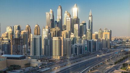 Dubai Marina towers during sunset aerial timelapse, United Arab Emirates
