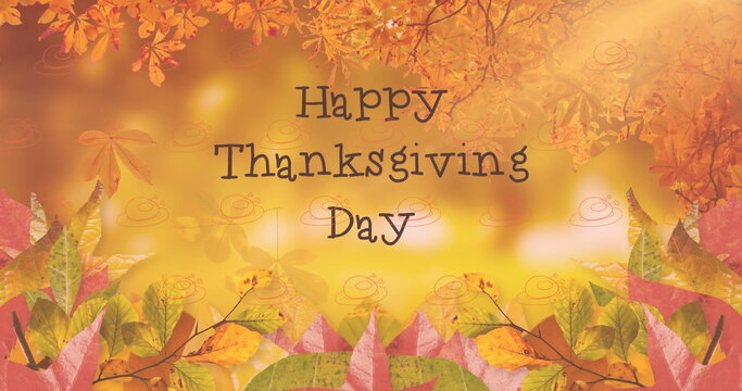 Fototapeta Image of happy thanksgiving day text over autumn leaves background
