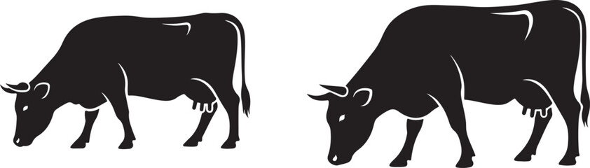 Silhouettes of Two Cows Grazing