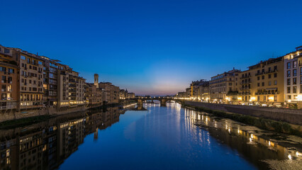 Ponte Santa Trinita Holy Trinity Bridge day to night timelapse over River Arno in Florence