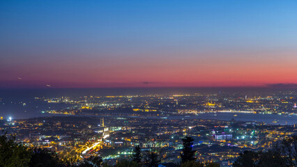Fototapeta premium Istanbul classical night skyline scenery day to night timelapse, view over Bosporus channel.