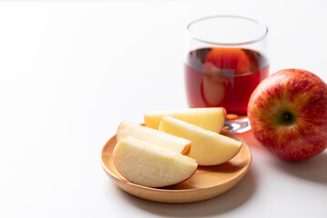 Sliced of apple fruit and apple cider on white background, Healthy eating
