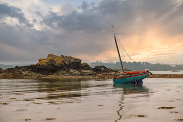 old sailboat in Brittany at rising tide.