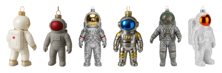 Astronaut ornament set including white, grey, silver, and distressed designs with red, blue, and orange visors isolated. Festive space holiday collection.